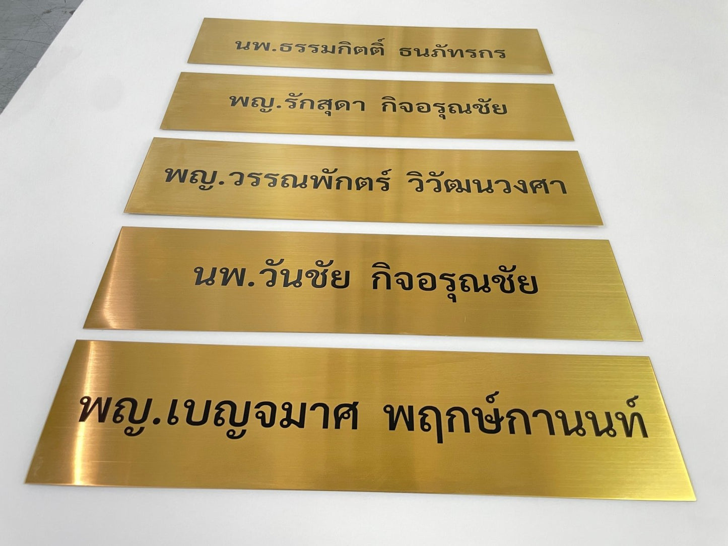 Stainless steel sign, gold hairline