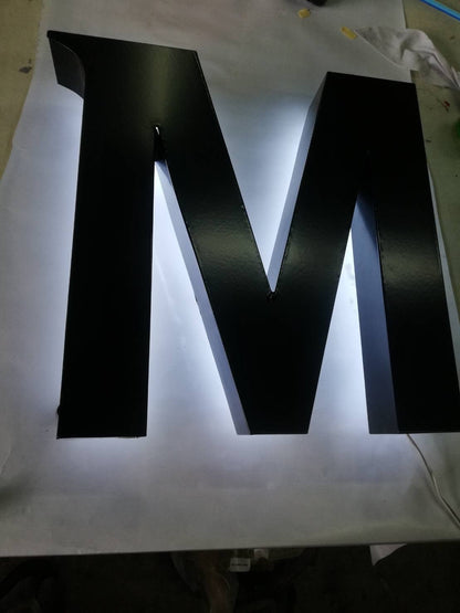 Backlit letters Covered on the back of acrylic to prevent reflection of light beads