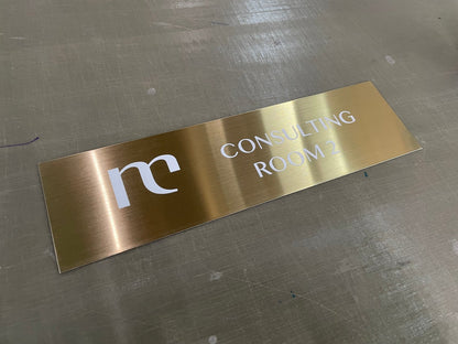 Stainless steel sign, gold hairline